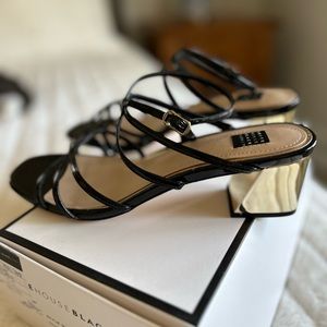 Women’s NWT black patent strappy leather sandals with gold finish heel